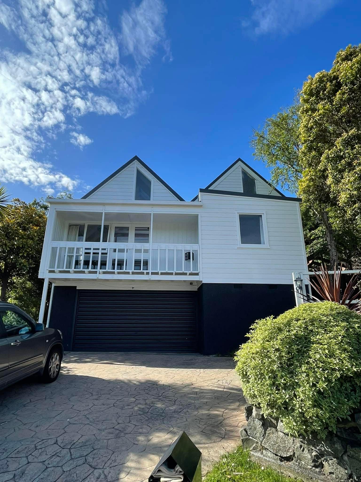 Two-storey white weatherboard house exterior repaint — Renoval Pro NZ Wellington