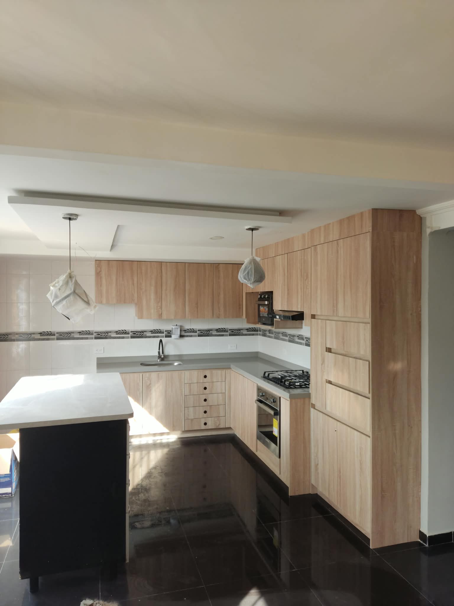 Kitchen cabinet painting with timber look finish — Renoval Pro NZ Wellington